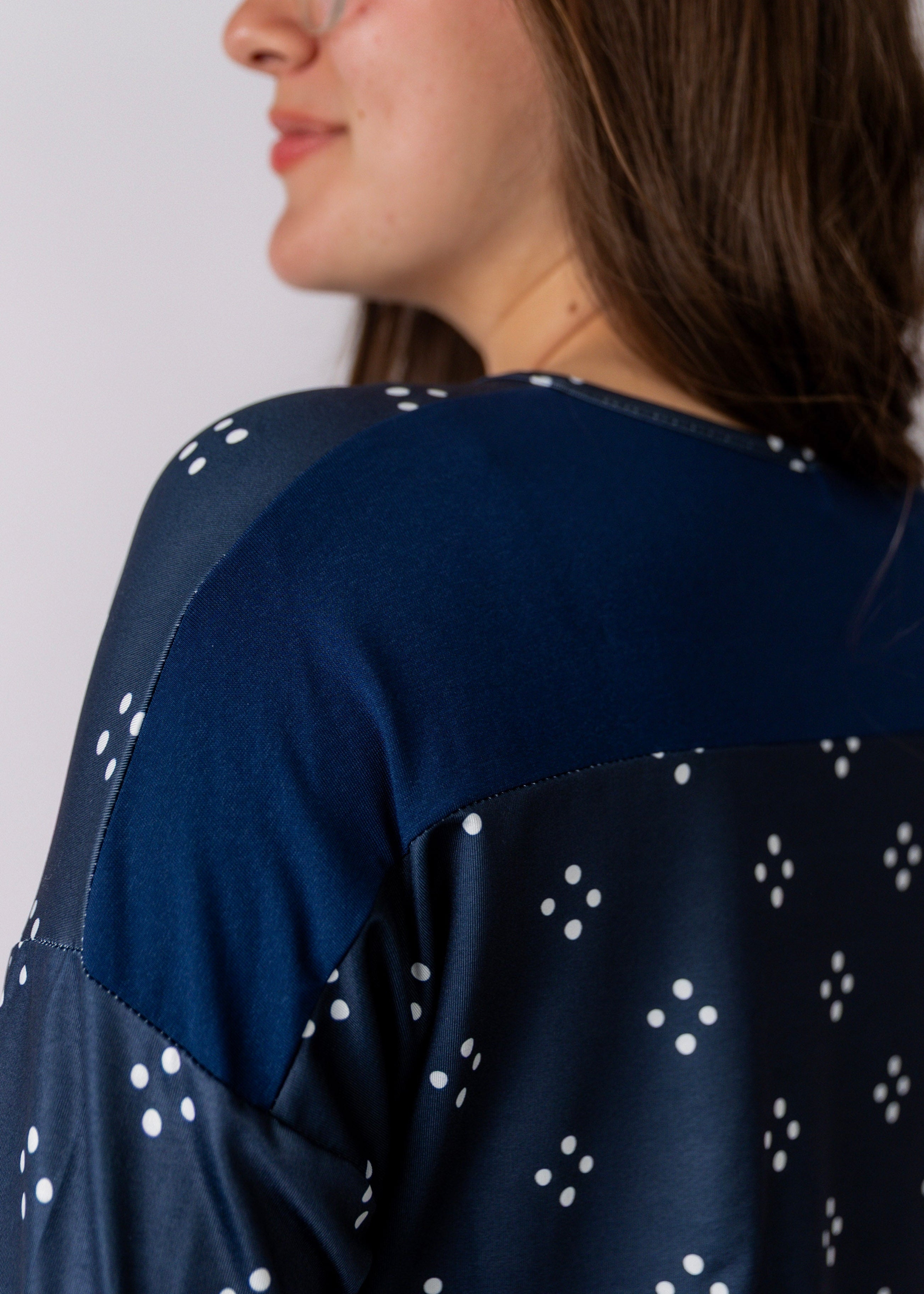Model wearing the Nuggles® Keegan Top in Starlit Navy print modest boutique top