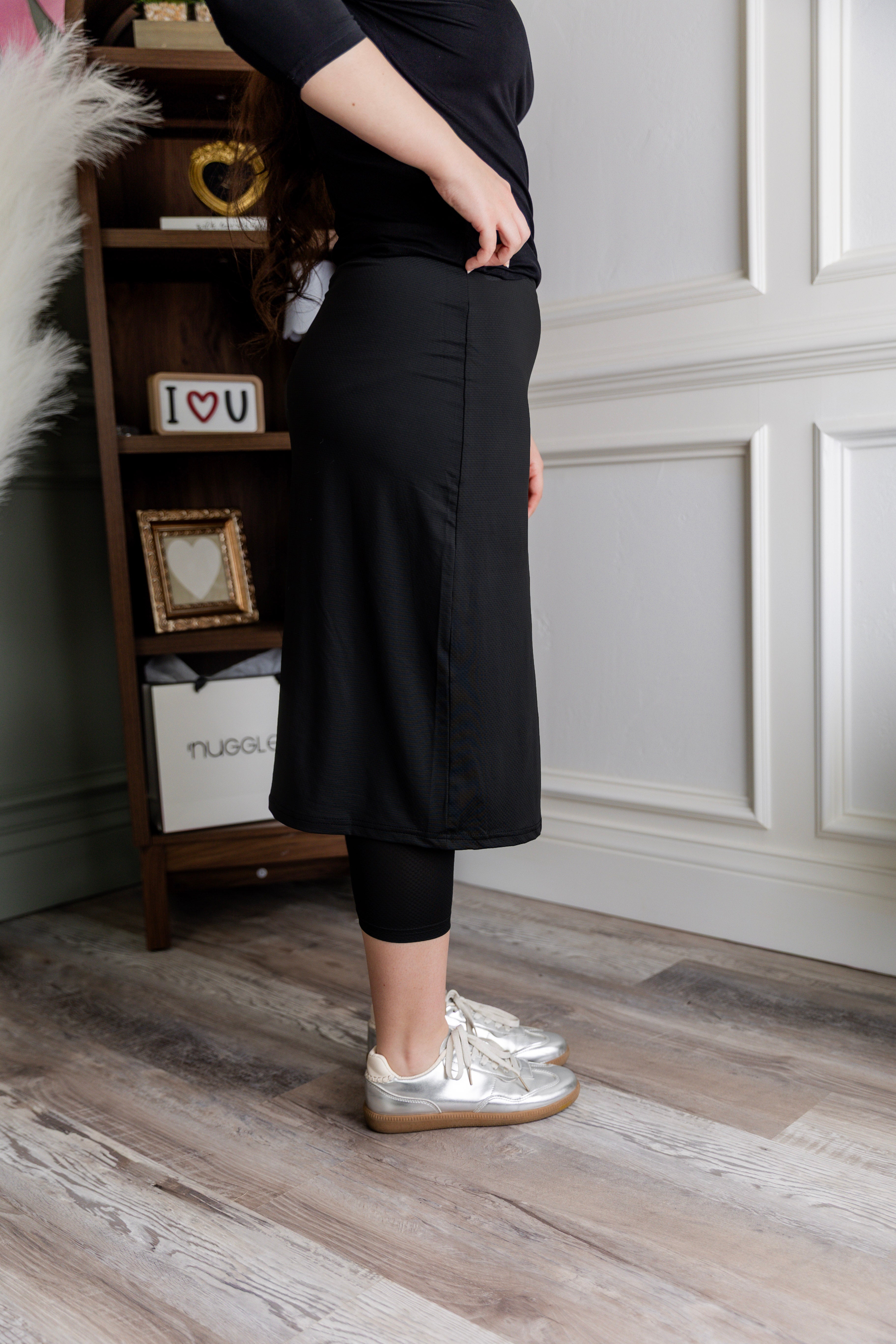 Model wearing Nuggles® 27" All-Sport Skirt in Black