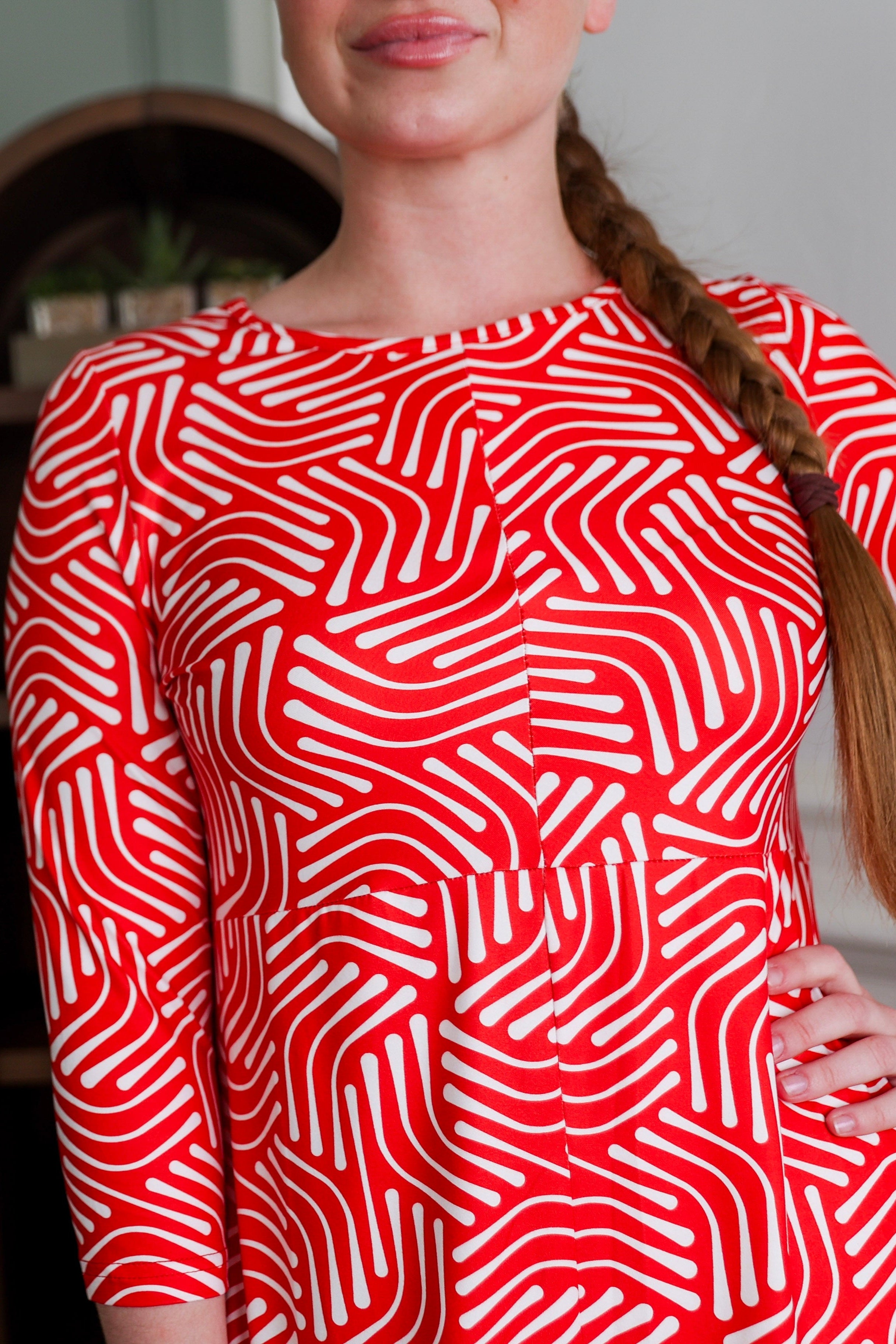 Model wearing Modest Nuggles® Cindy Bubble Dress in Berry Maze