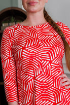 Model wearing Nuggles® Cindy Bubble Dress in  Berry Maze 