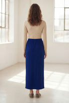 Model wearing Nuggles® 36" Classic Skirt in Dark Royal