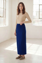 Model wearing Nuggles® 36" Classic Skirt in Dark Royal