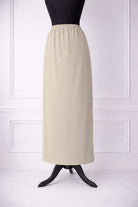 Stock photo of our Nuggles® 36-inch classic skirt elastic waistband and straight silhouette in Nude