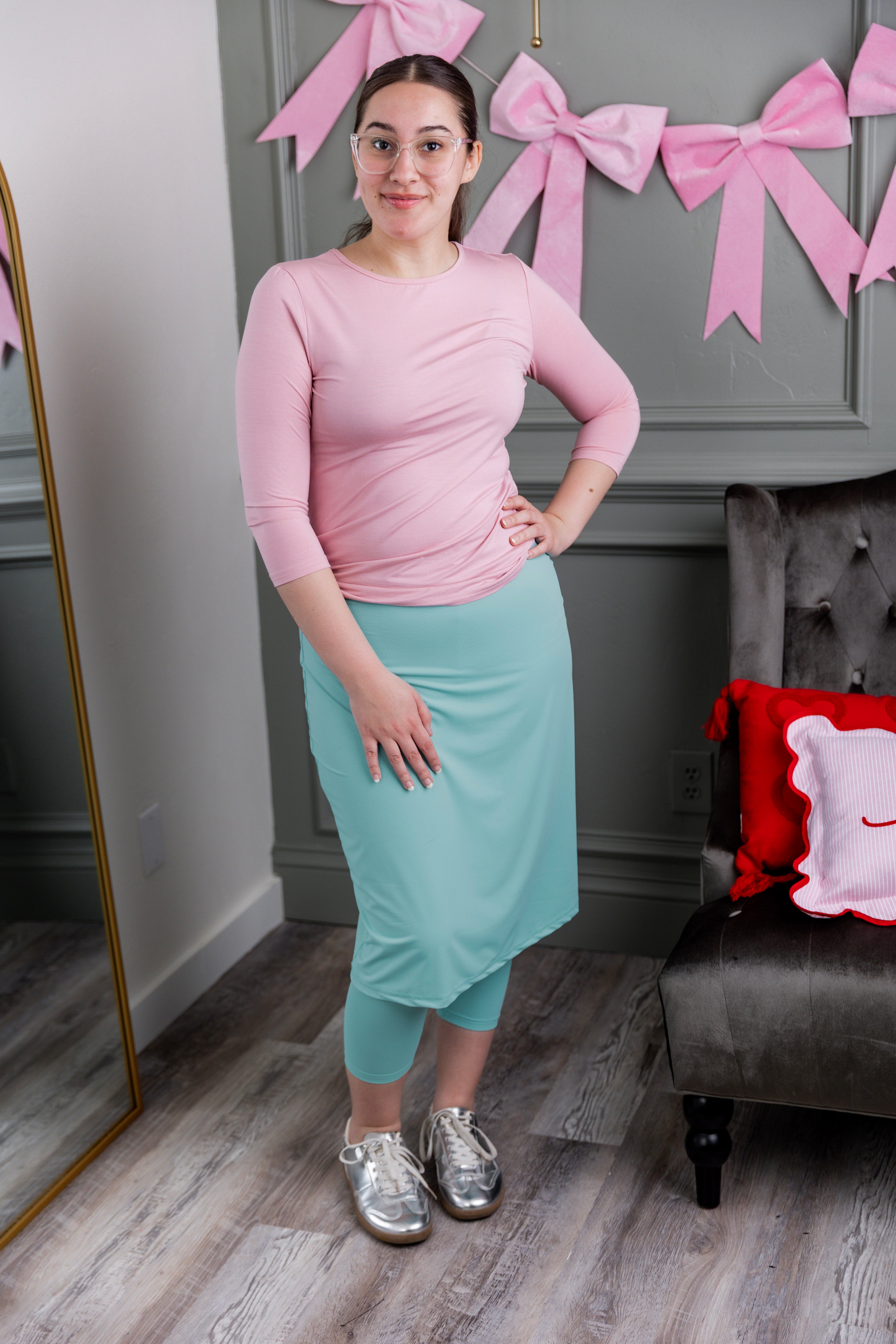 Model wearing Nuggles® 27" All-Sport Skirt in Aqua