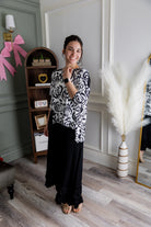 Model wearing Nuggles® Callie Skirt in Black modest skirt