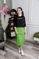 Model wearing Nuggles® 27" All-Sport Skirt in Green