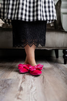 Model wearing our modest Nuggles® 27" crochet lace slip in Black