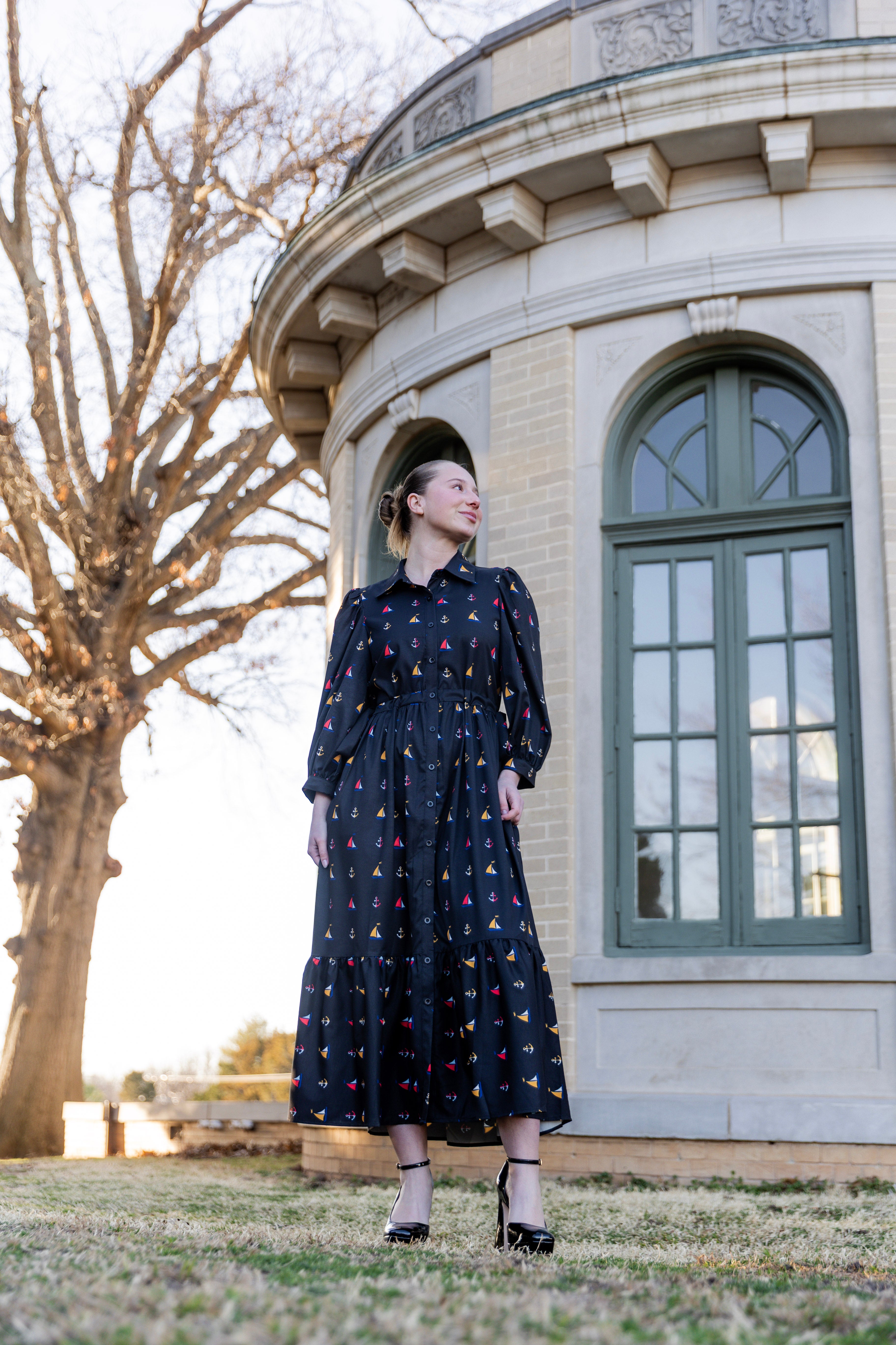 Model wearing the Nuggles® Leila Dress in Tiny Skipper