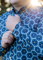 Model wearing Nuggles® Mens' Button Down Shirt Forge Tile