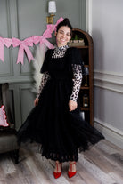 Model wearing Nuggles® Mesh Tee top in Snow Leopard