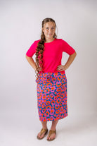 Model wearing the Nuggles® Essential Half Sleeve Tee in Hot Pink