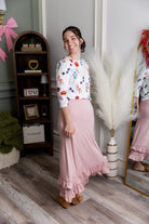 Model wearing Nuggles® Callie Skirt in Baby Pink Modest skirt