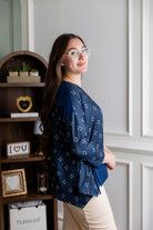Model wearing the Nuggles® Keegan Top in Starlit Navy print modest boutique top