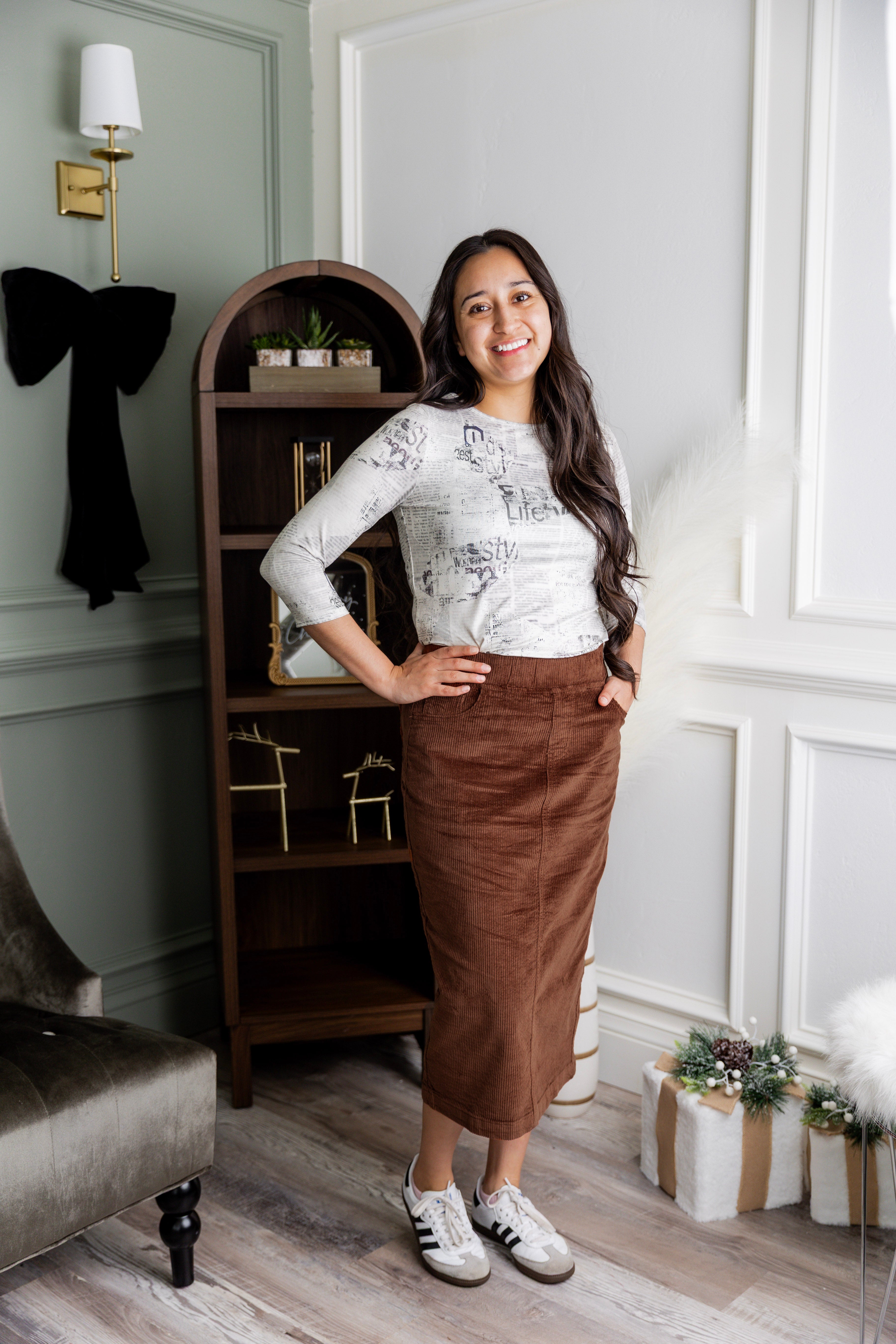 Model wearing Nuggles® 31-inch corduroy skirt