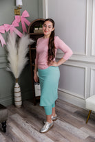 Model wearing Nuggles® 27" All-Sport Skirt in Aqua