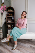 Model wearing Nuggles® 27" All-Sport Skirt in Aqua