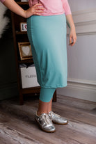 Model wearing Nuggles® 27" All-Sport Skirt in Aqua