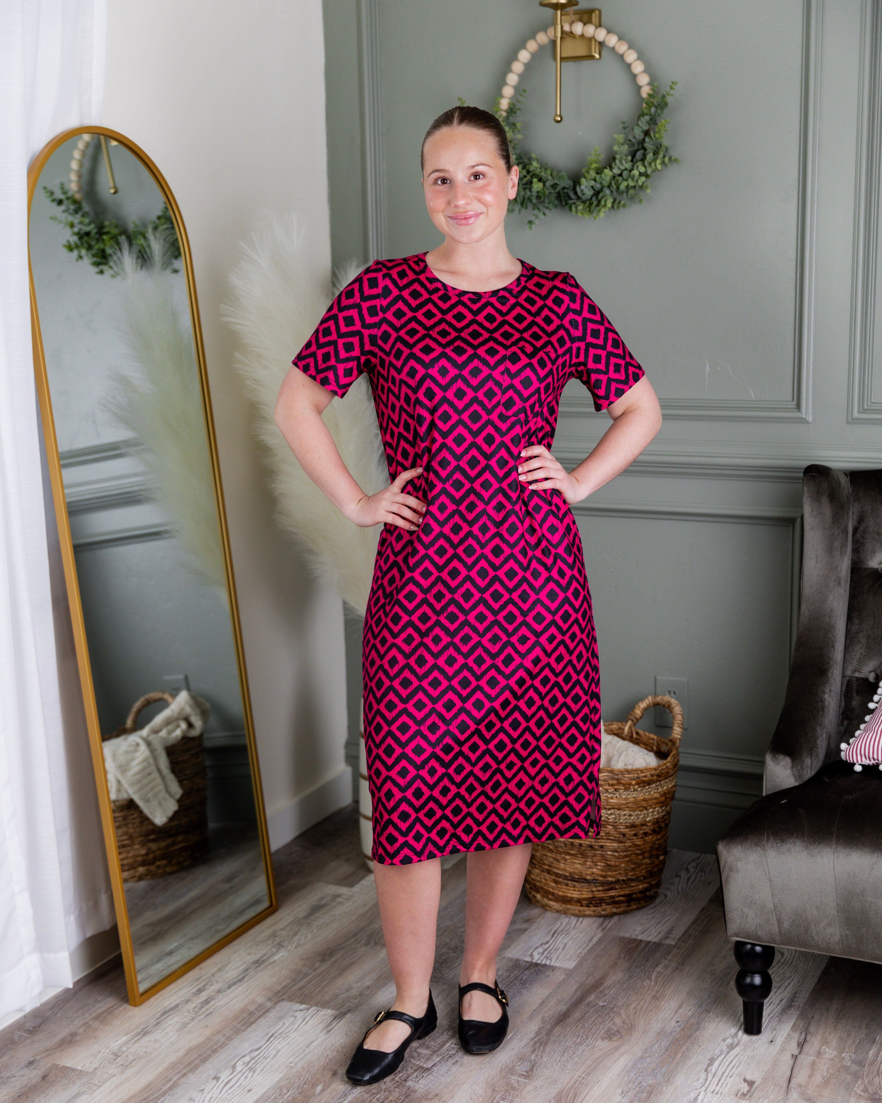 Model wearing Modest Nuggles® Aviva Dress in Bold Berry