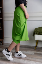 Model wearing Nuggles® 27" All-Sport Skirt in Green