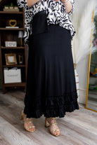 Model wearing Nuggles® Callie Skirt in Black modest skirt