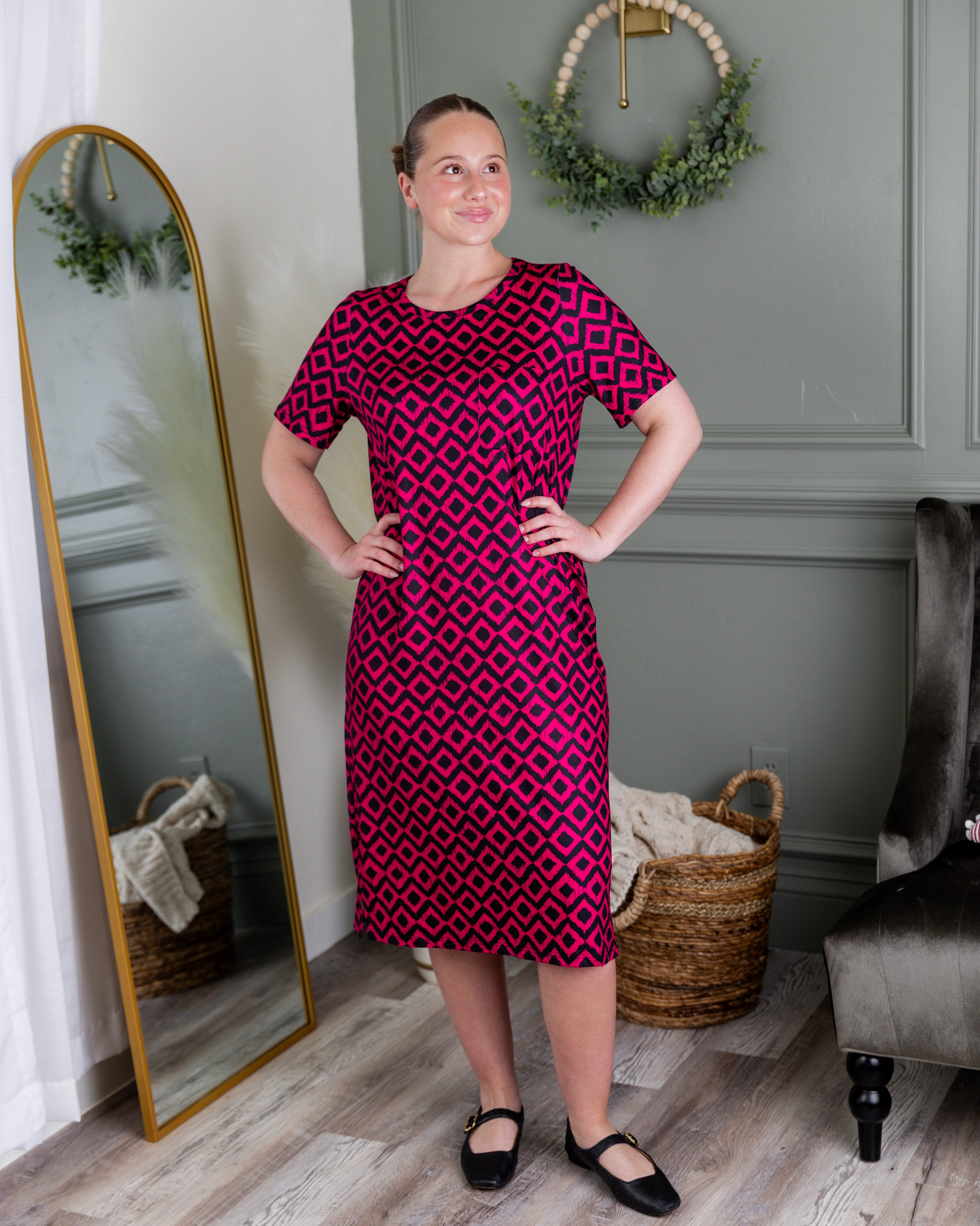Model wearing Modest Nuggles® Aviva Dress in Bold Berry