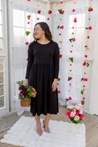 Model wearing the Nuggles® Farah Dress in Black 