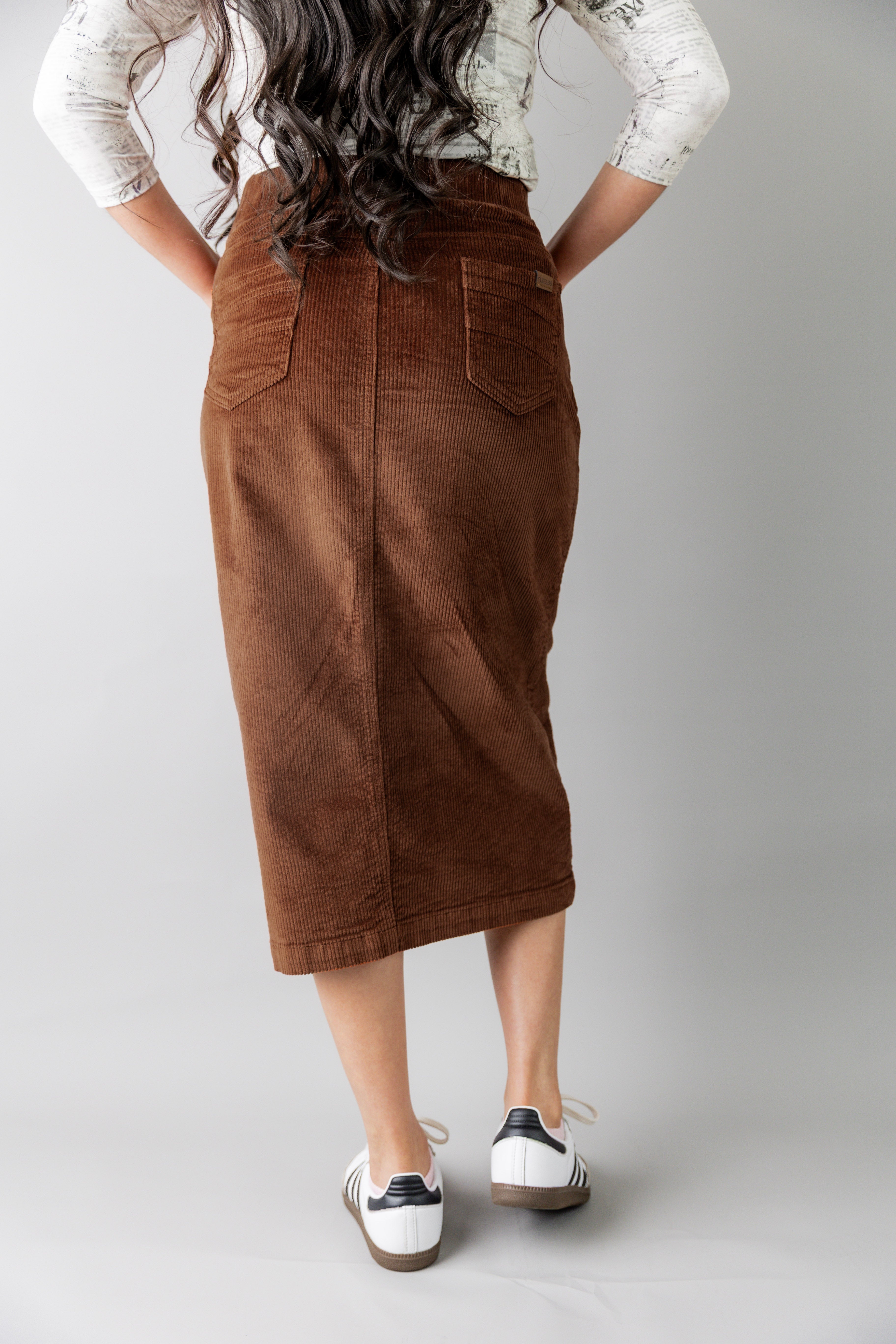 Model wearing Nuggles® 31-inch corduroy skirt