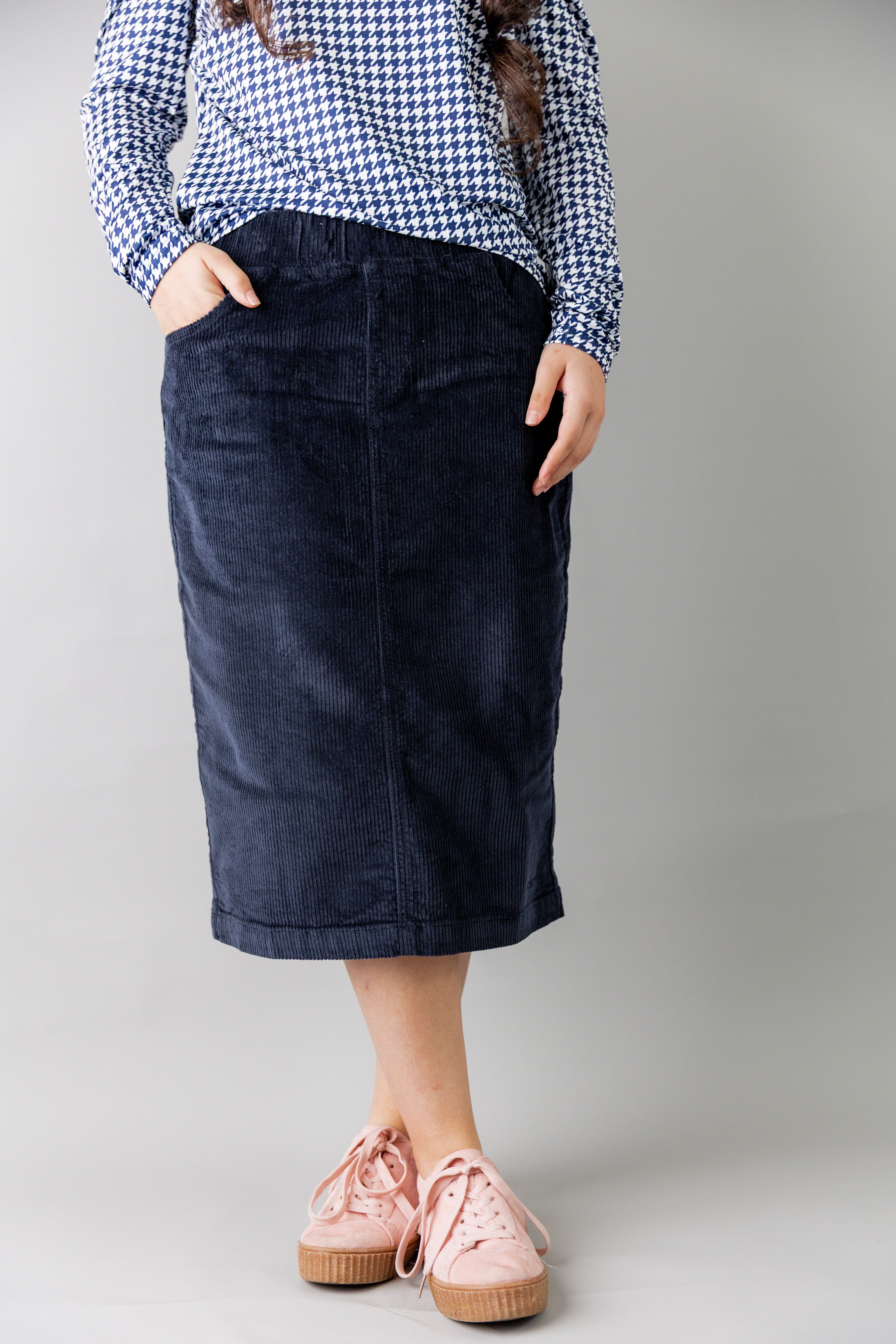 Model wearing Nuggles® 27-inch corduroy skirt