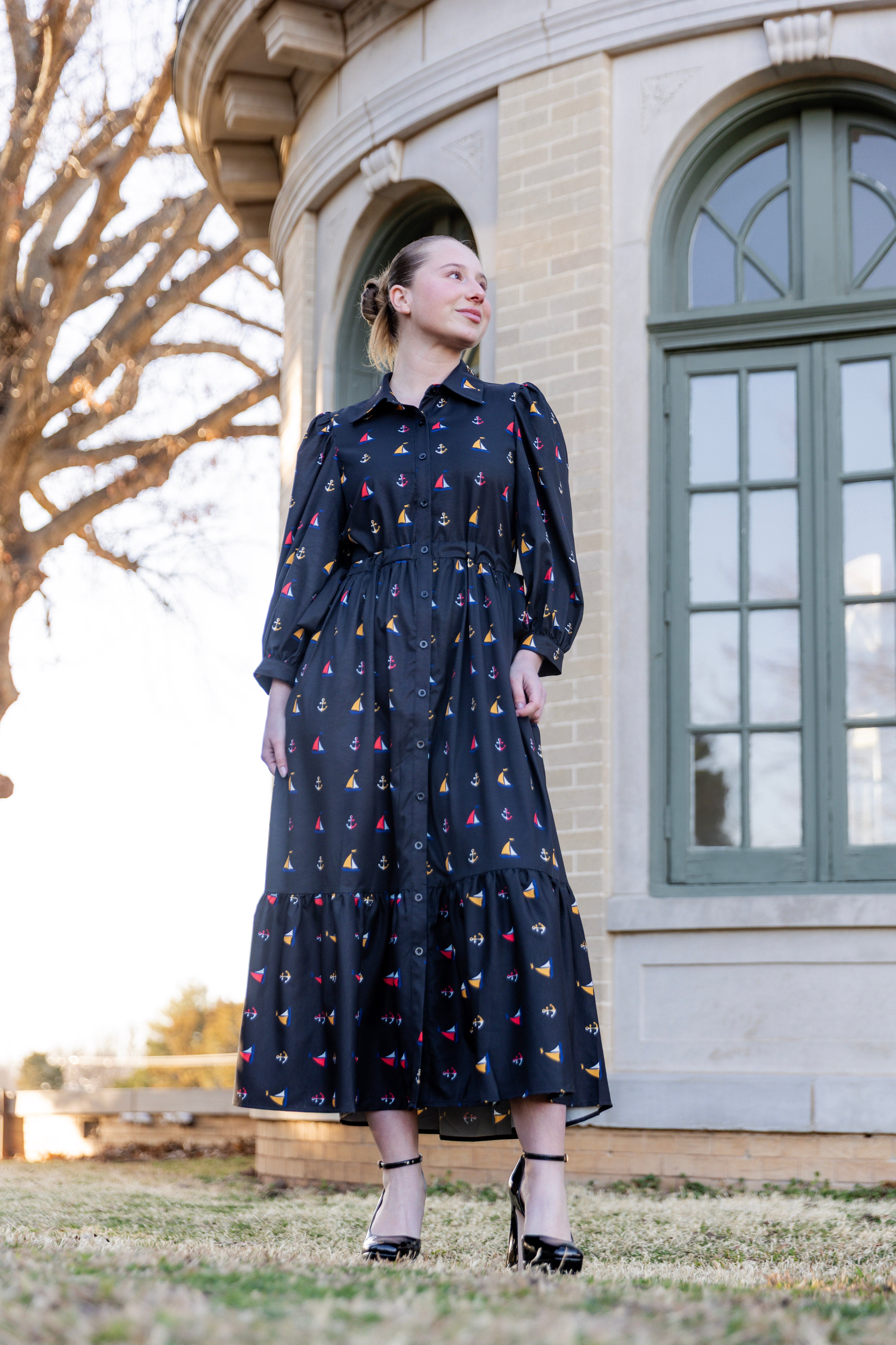 Model wearing the Nuggles® Leila Dress in Tiny Skipper