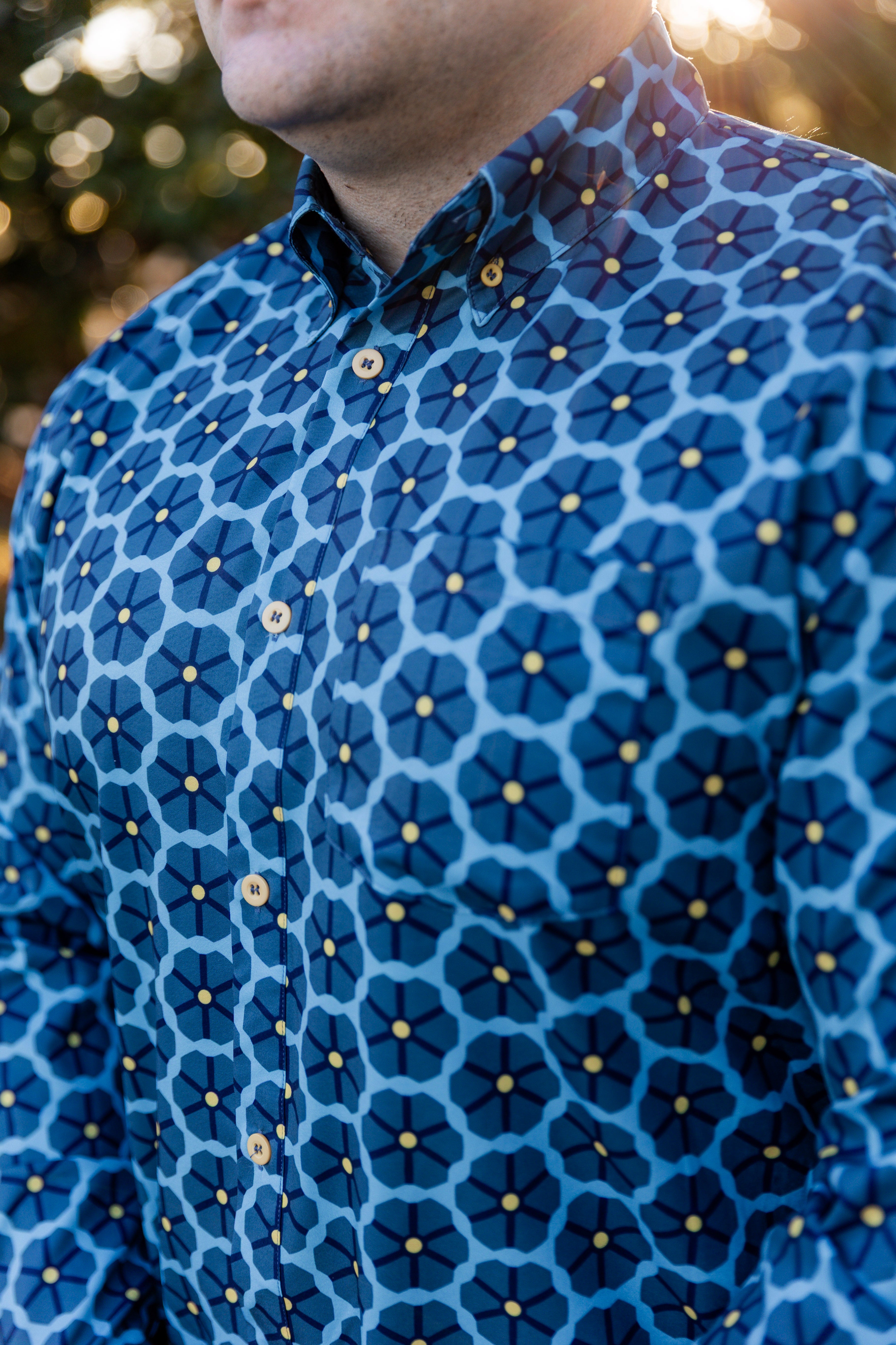 Model wearing Nuggles® Mens' Button Down Shirt Forge Tile