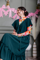 Model wearing Nuggles® Mesh Tee top in Confetti Bloom