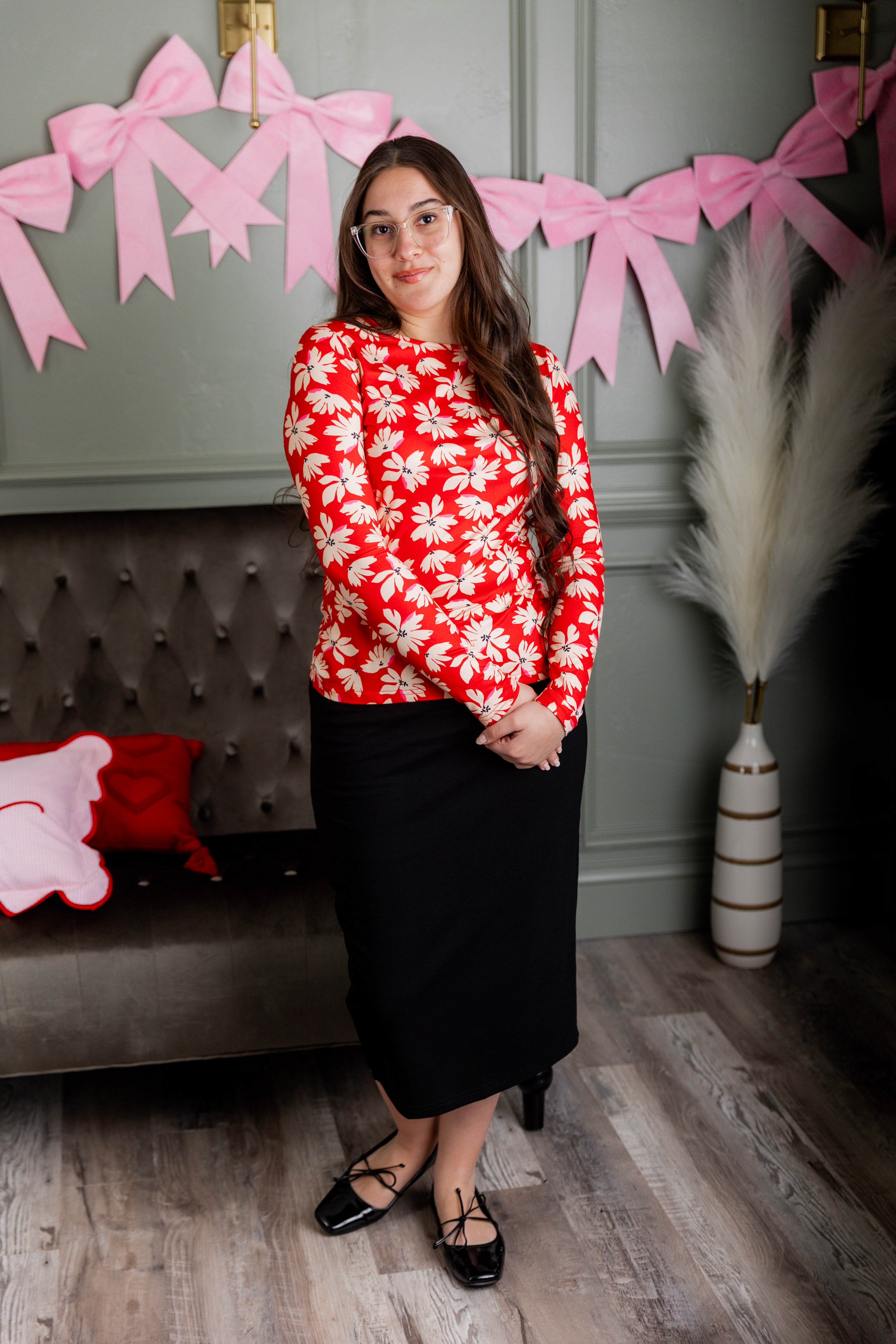 Model wearing Nuggles® Essential Long Sleeve Tee in Red Petal Party