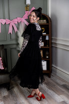 Model wearing Nuggles® Mesh Tee top in Snow Leopard