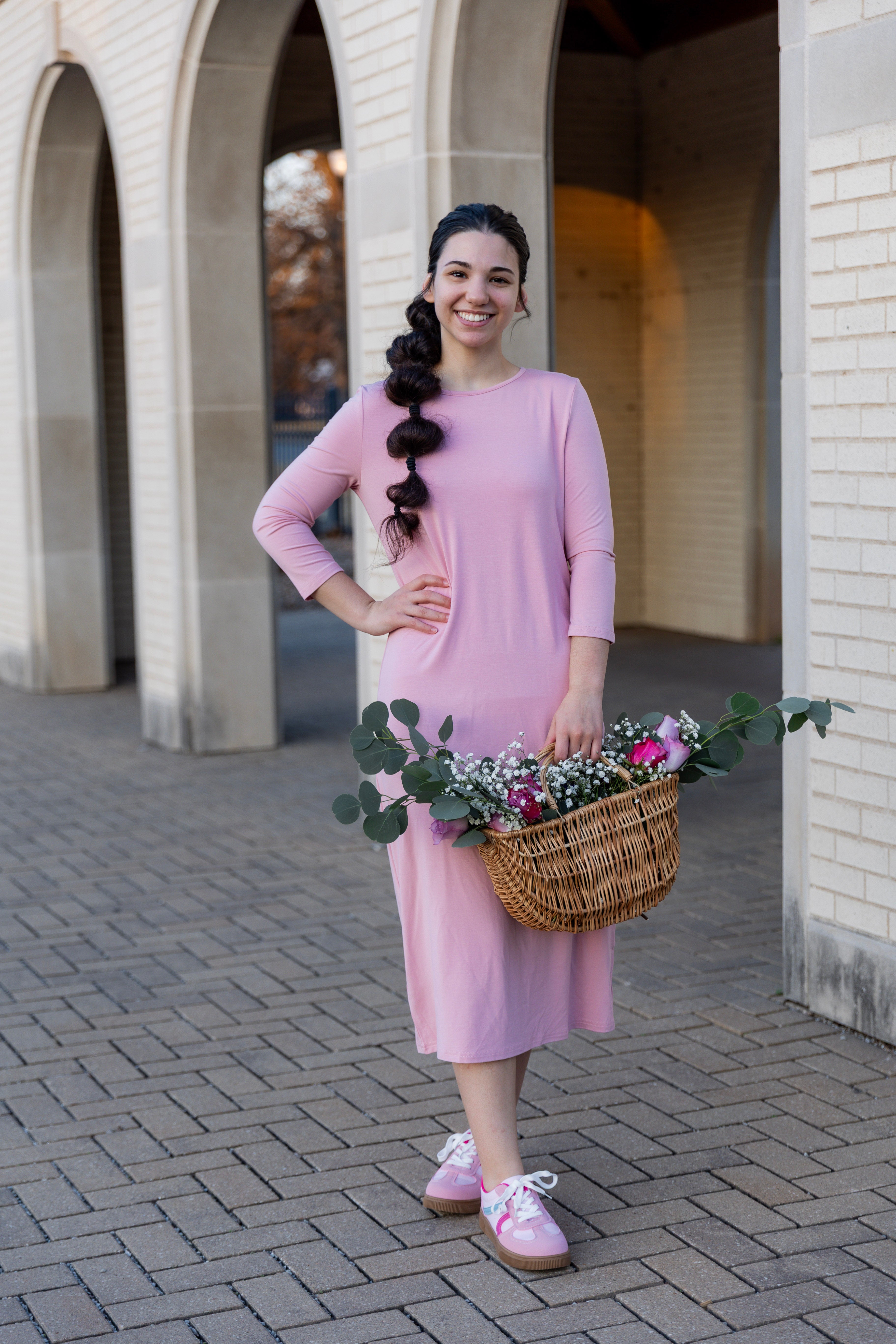 Model wearing Nuggles®  original midi layering dress in Baby Pink