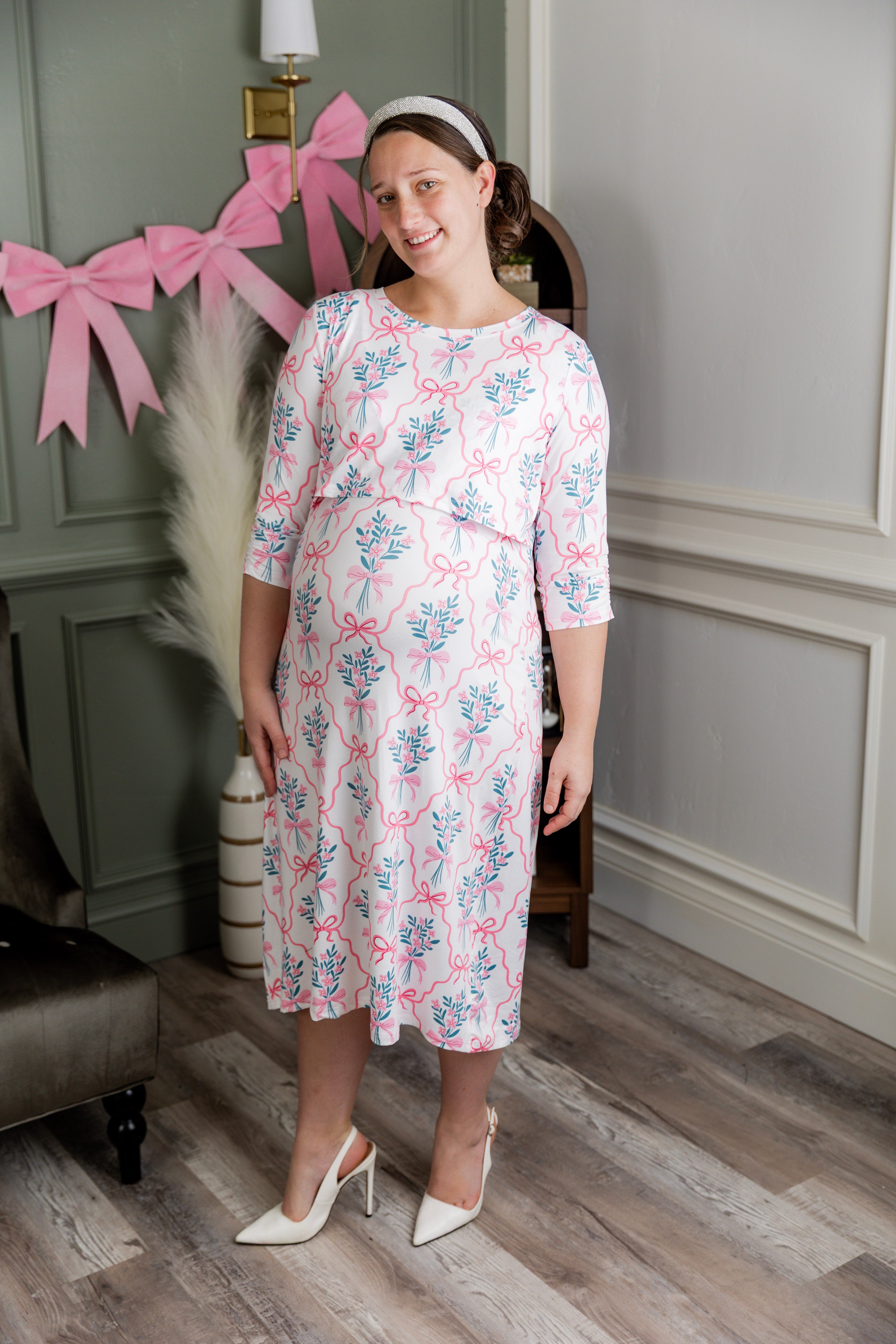 Model wearing Nuggles® Nalani Nursing Dress in Pixie Petals 