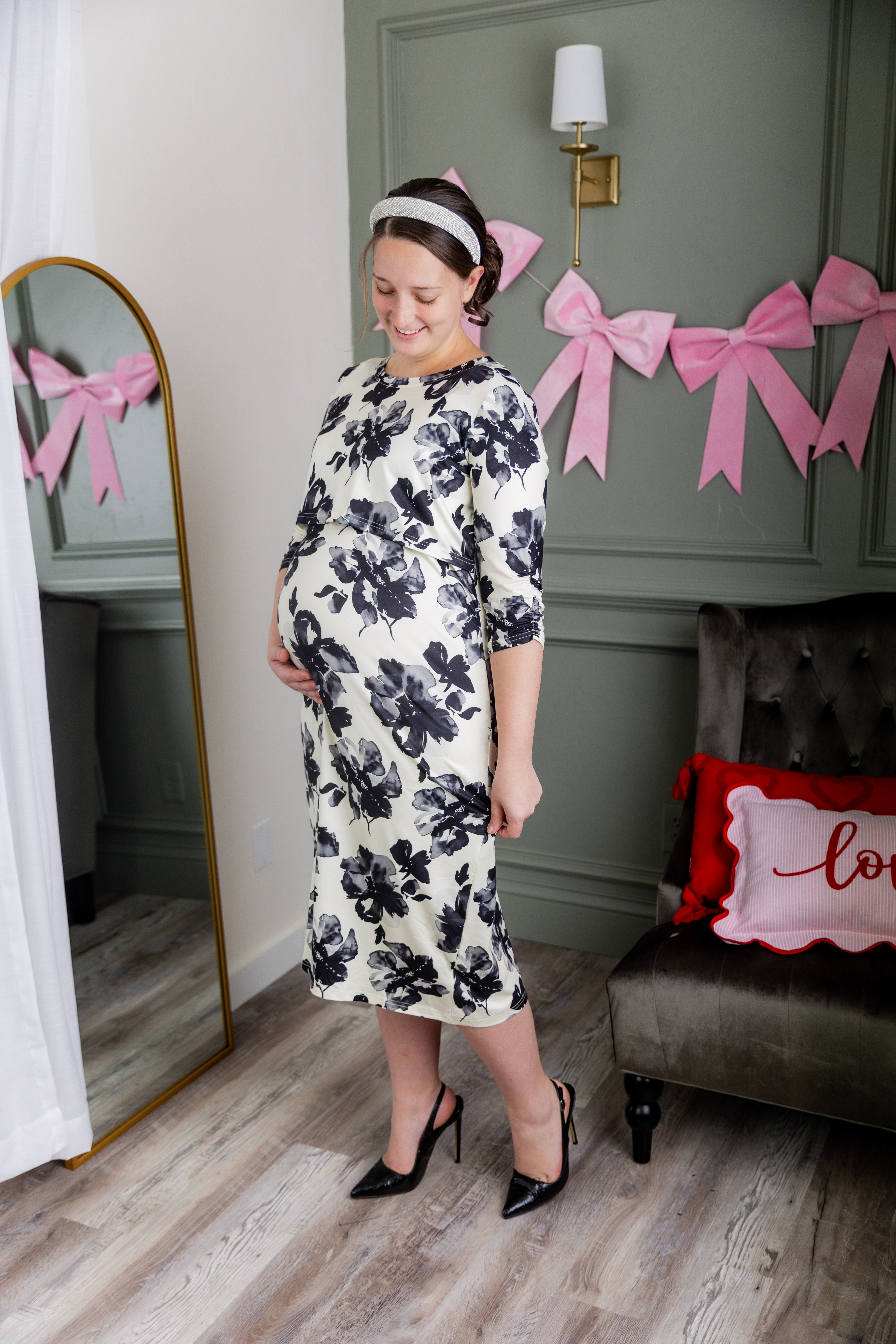 Model wearing Nuggles® Nalani Nursing Dress in Ink Blossom