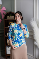 Model wearing Nuggles®  3/4 Essential Tee in Lakeside Garden