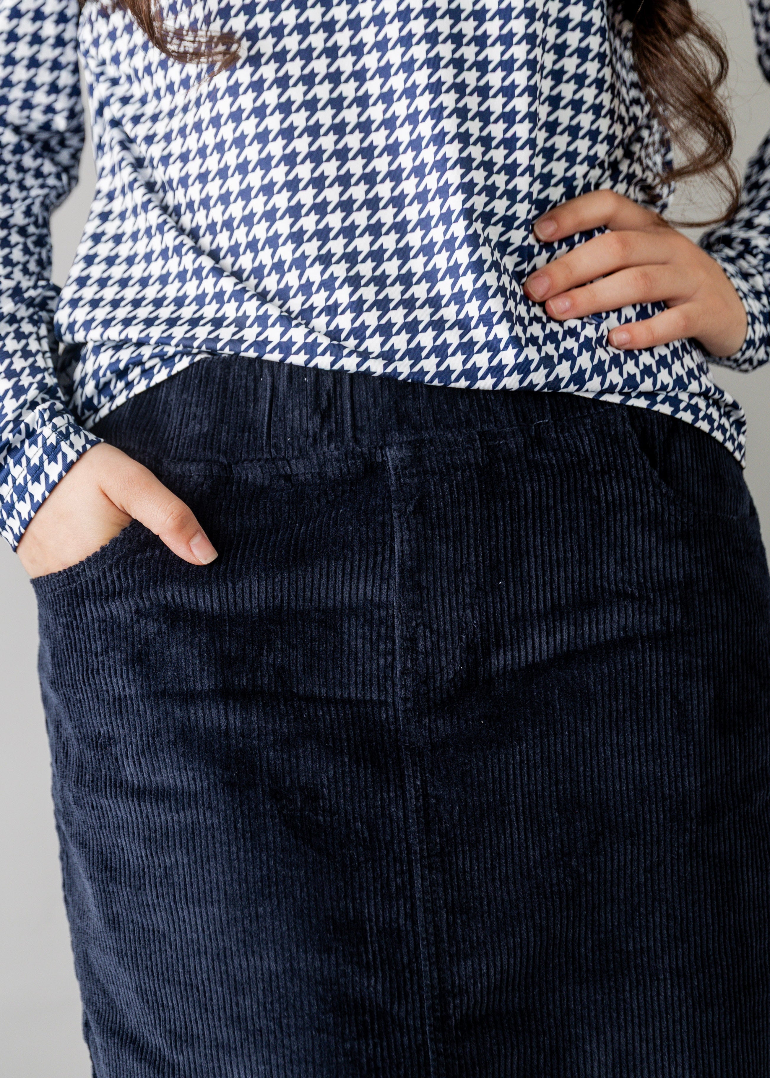 Model wearing Nuggles® 27-inch corduroy skirt