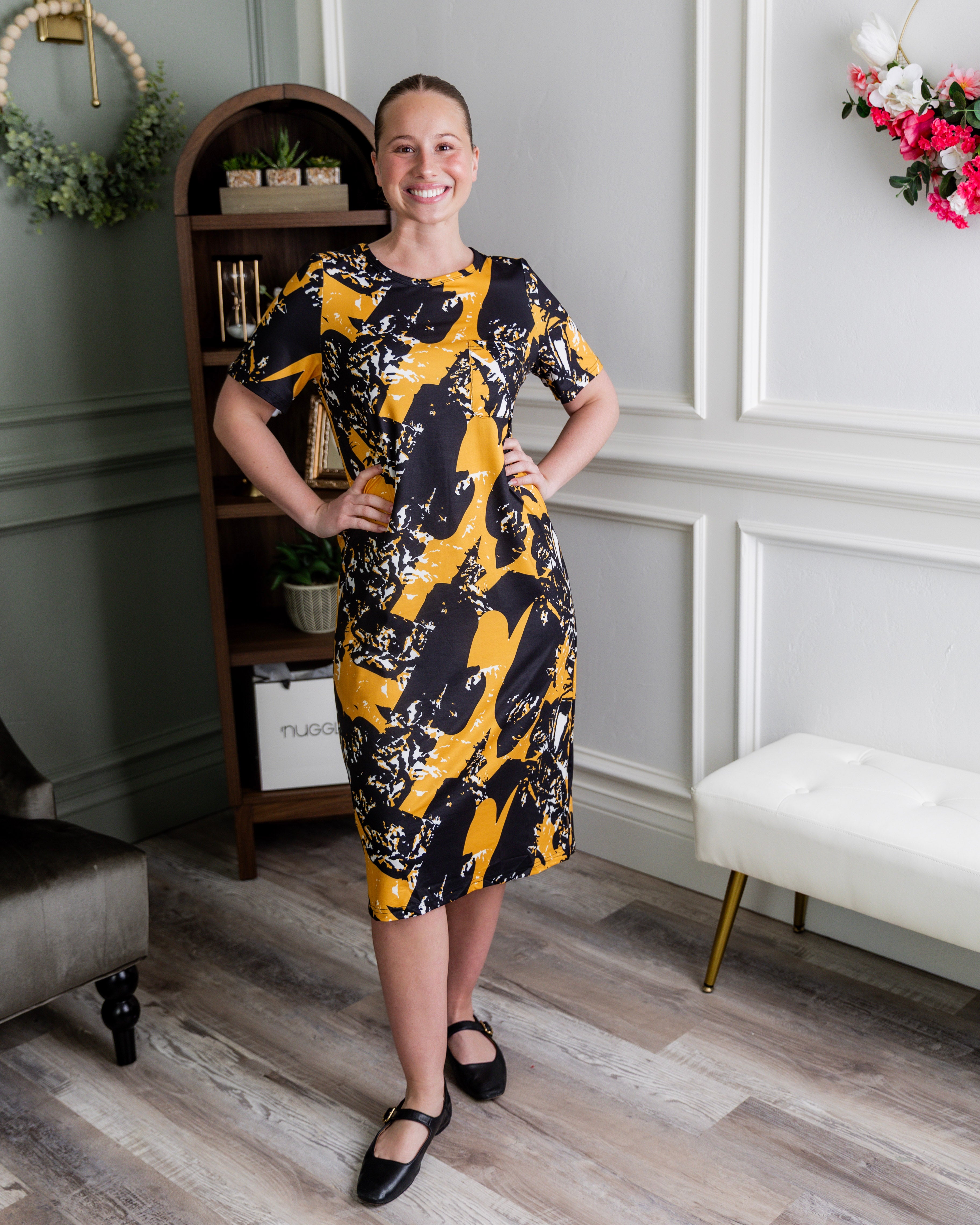 Model wearing Modest Nuggles® Aviva Dress in Golden Drift