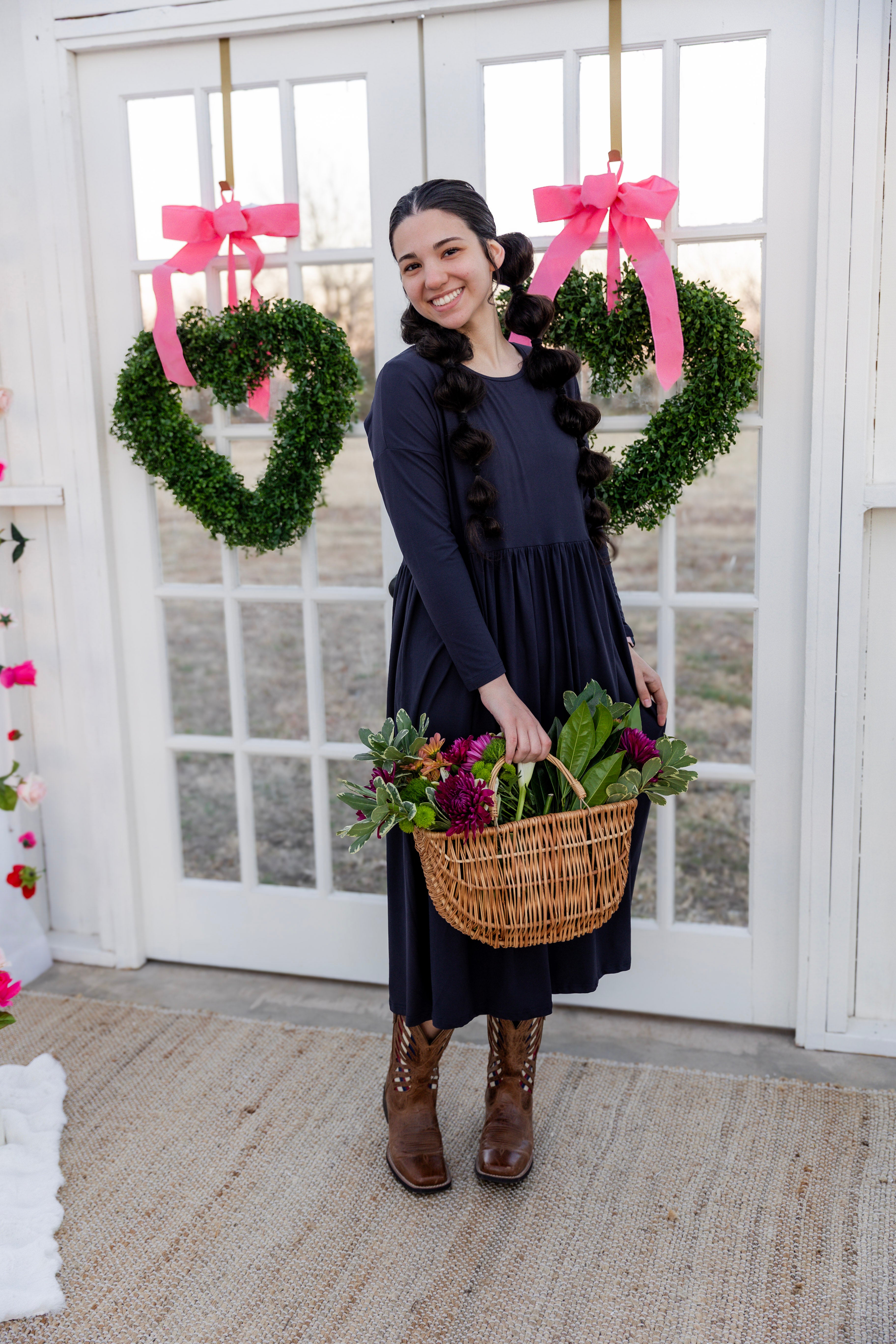 Model wearing the Nuggles® Farah Dress in Navy