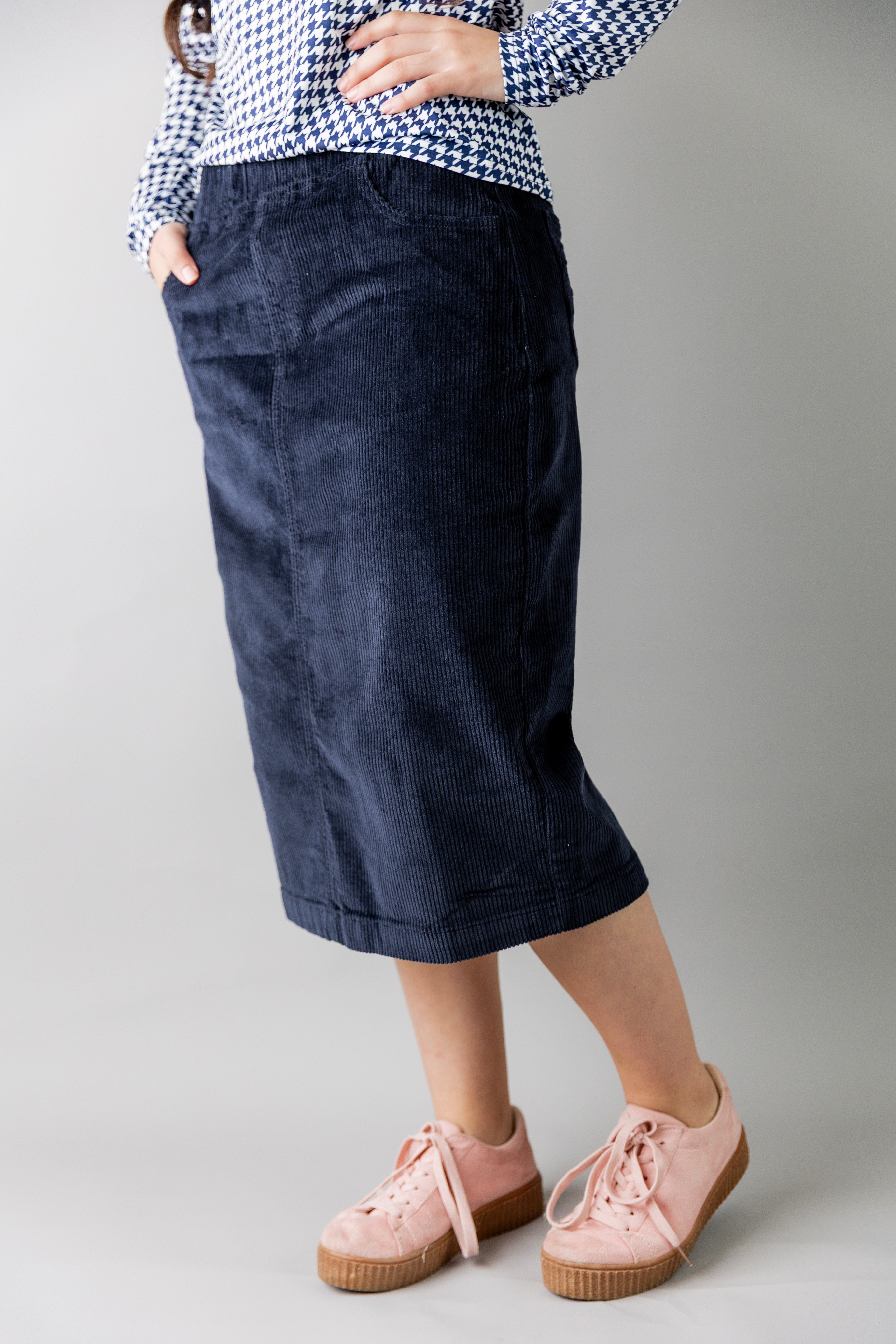 Model wearing Nuggles® 27-inch corduroy skirt