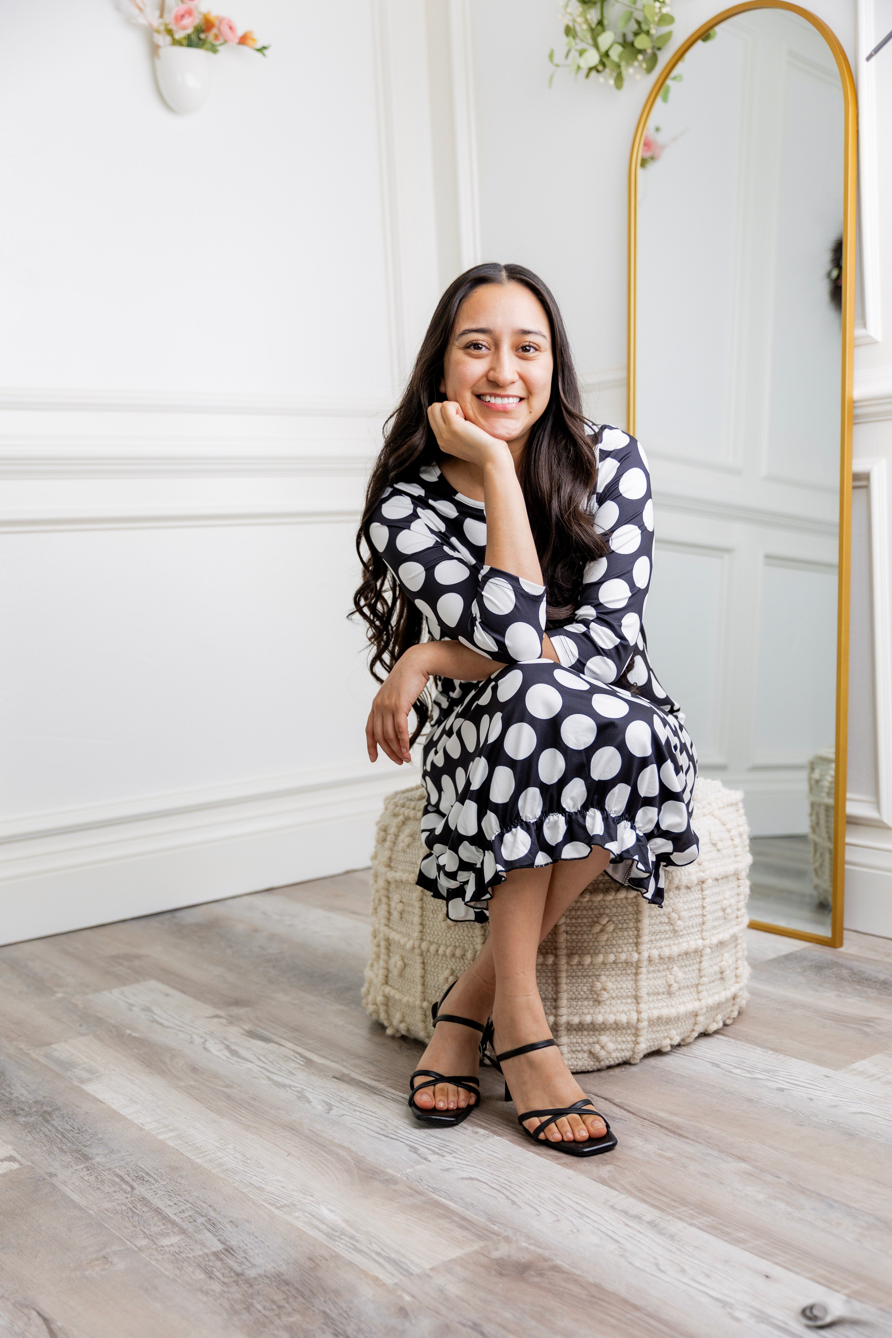 Model wearing our Nuggles® modest Bristol midi dress with 3/4 sleeves and elastic ruffle hem in various prints.