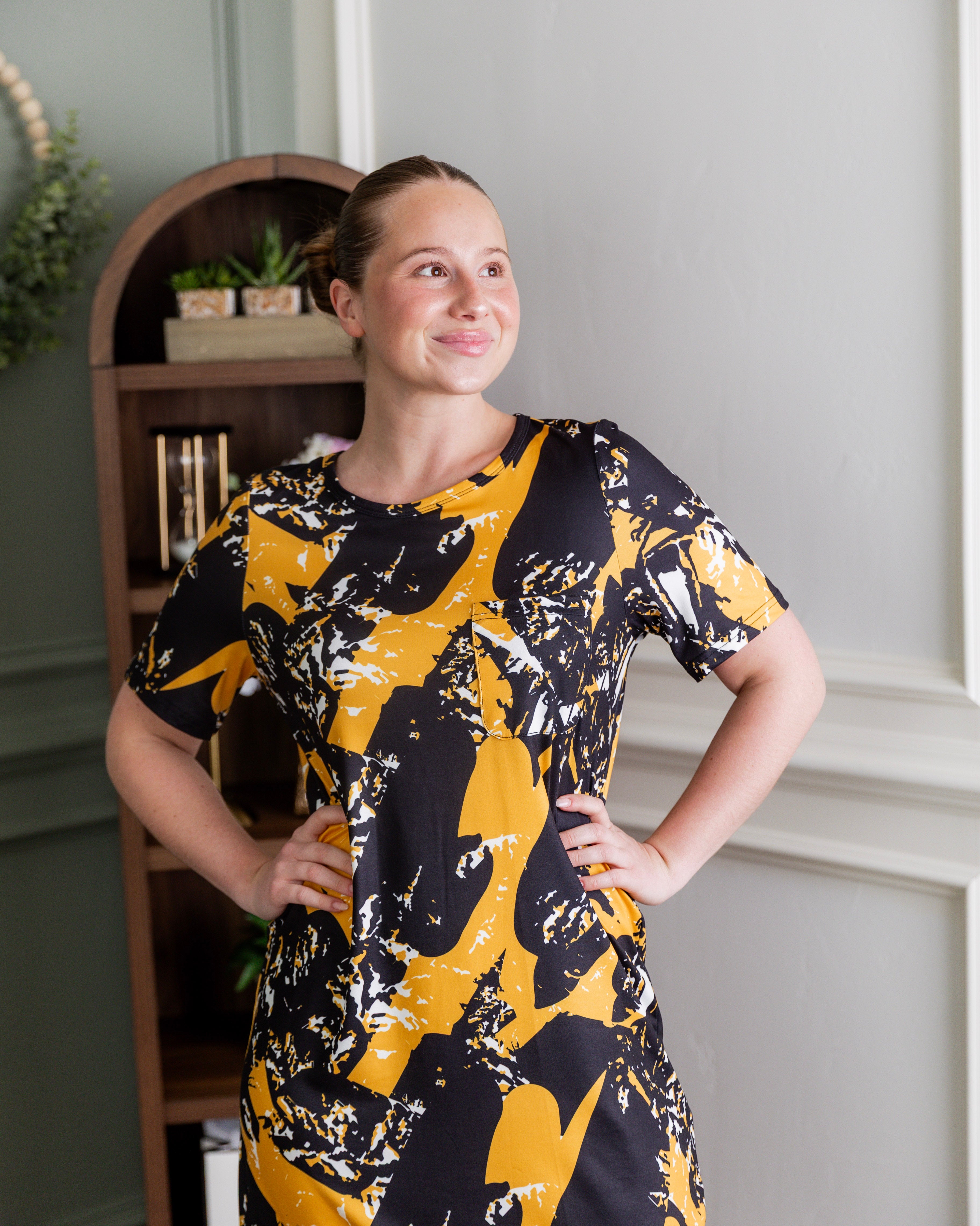 Model wearing Modest Nuggles® Aviva Dress in Golden Drift