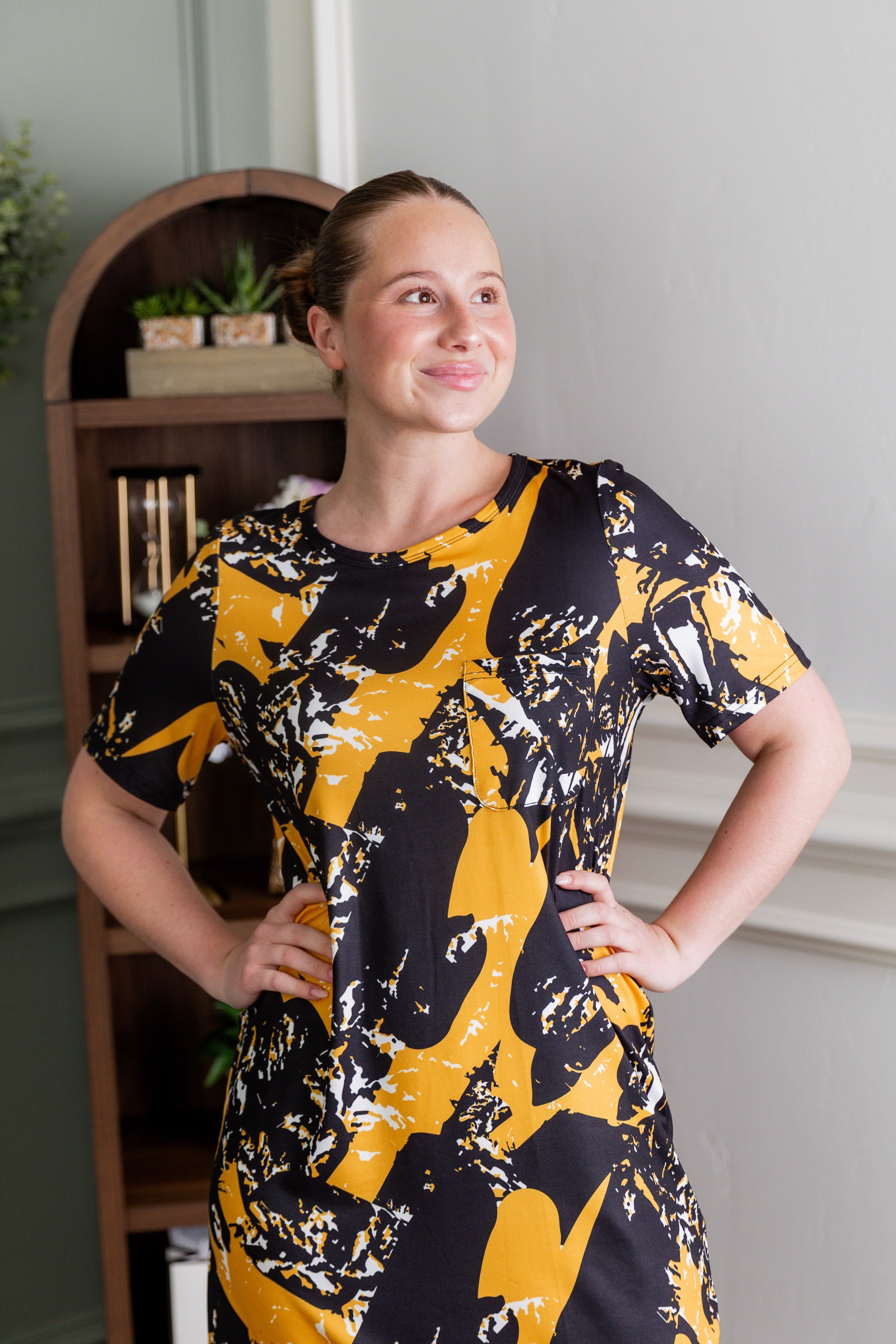 Model wearing Modest Nuggles® Aviva Dress in Golden Drift