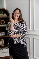 Model wearing the Nuggles® Keegan Top in Honey Leopard print modest boutique top