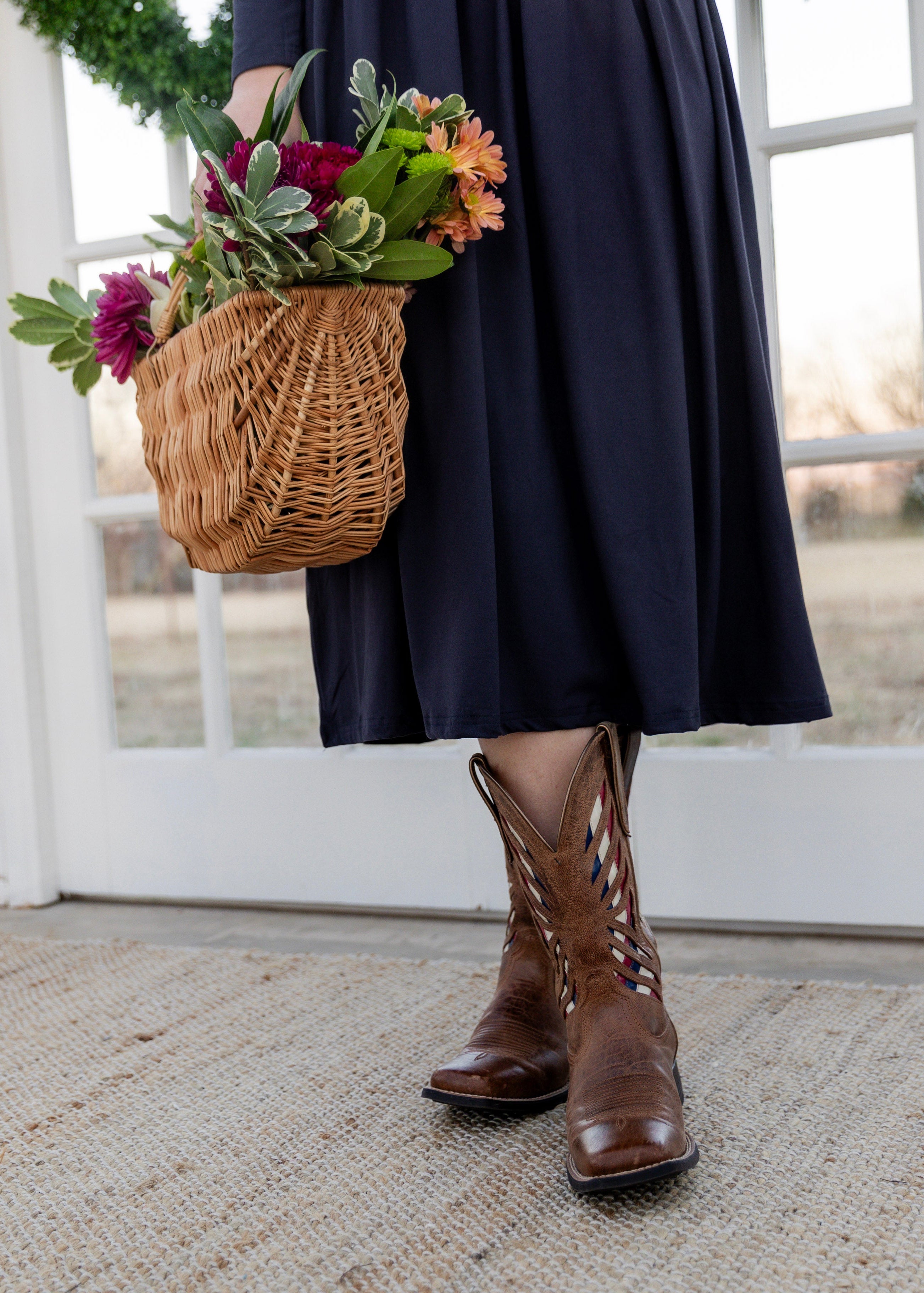 Model wearing the Nuggles® Farah Dress in Navy