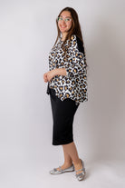 Model wearing the Nuggles® Keegan Top in Honey Leopard print modest boutique top