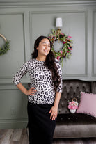 Model wearing Nuggles®  3/4 Essential Tee in Snow Leopard