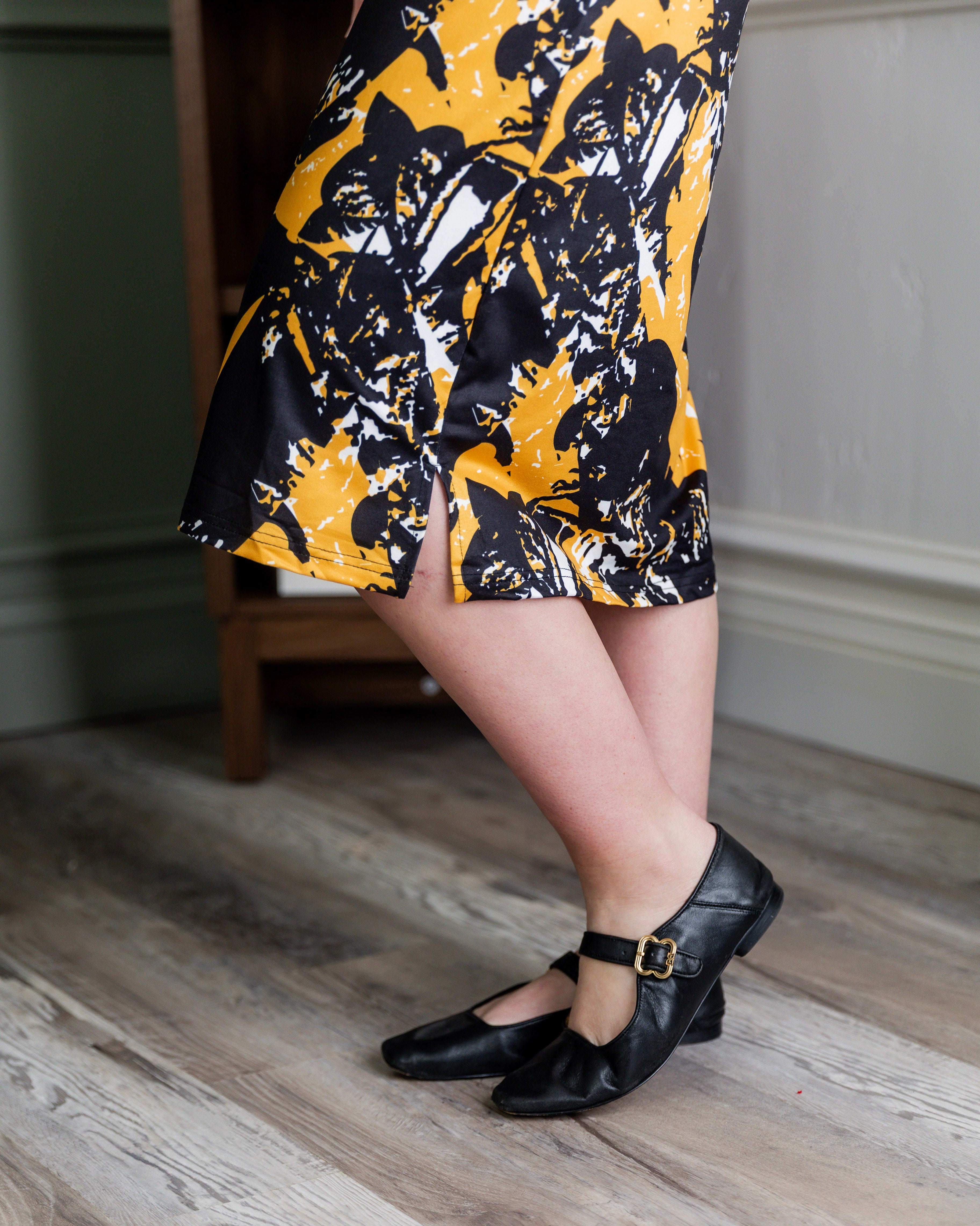 Model wearing Modest Nuggles® Aviva Dress in Golden Drift