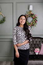 Model wearing Nuggles®  3/4 Essential Tee in Snow Leopard